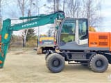 2012 Hitachi Zaxis 140W wheel excavator, side view