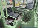 1996 Unimog AT16 wheel excavator cab interior view