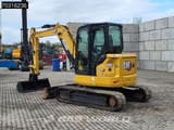 2022 Caterpillar 305 CR mini excavator, rear three-quarter view