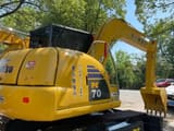 2024 Komatsu PC70-8 mini excavator, rear three-quarter view