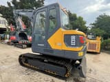 2024 Volvo EC55D mini excavator, rear three-quarter view