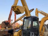2025 Komatsu PC78 mini excavator, front three-quarter view