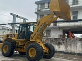 2020 Caterpillar 966H wheel loader, side profile view