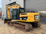 2011 Caterpillar 319D L crawler excavator, rear three-quarter view
