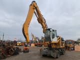 2009 Liebherr A904 C wheel excavator, front three-quarter view