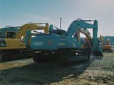 2024 Kobelco SK260D crawler excavator, rear three-quarter view