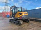 2023 XCMG XE80E mini excavator, rear three-quarter view