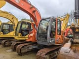 2016 Hitachi ZX135US crawler excavator, side view