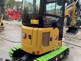 2024 Caterpillar 302CR mini excavator, front three-quarter view