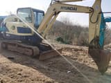 2023 Hyundai R60-9 mini excavator, side profile view
