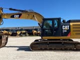 2014 Caterpillar 324ELN crawler excavator, side view