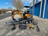 Berger Kraus BK1350JSR mini excavator on trailer with attachments