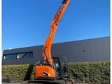 2020 Doosan DX140LCR-5 crawler excavator, side view with boom raised