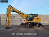 2018 Caterpillar MH3024 material handler, side view