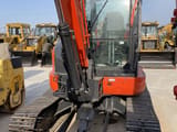 Kubota KX165-5 mini excavator, front view of cab and boom