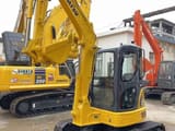 2020 Komatsu PC-55MR mini excavator, front three-quarter view