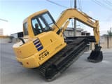 2022 Komatsu PC60 crawler excavator rear three-quarter view