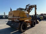 1992 Liebherr A900C wheel excavator, rear three-quarter view