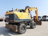 2015 Hyundai R140W-9A wheel excavator, rear three-quarter view