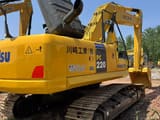 2024 Komatsu PC220 crawler excavator, rear three-quarter view
