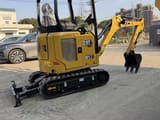 2022 Caterpillar 301.7 mini excavator, rear three-quarter view