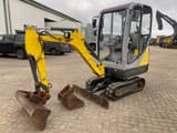 2014 Wacker Neuson 1404 mini excavator, front three-quarter view