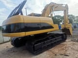 2023 Caterpillar 325C crawler excavator, rear three-quarter view