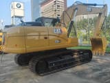 2025 Caterpillar 320GX crawler excavator, rear three-quarter view