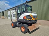 2020 Bobcat E57W wheel excavator, rear three-quarter view
