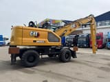2022 Caterpillar MH3024 wheel excavator, side profile view