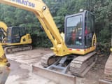 2016 Komatsu PC56-7 mini excavator, front three-quarter view