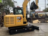 2021 Caterpillar 305.5E2 mini excavator, rear three-quarter view