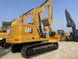 2024 Caterpillar 323 crawler excavator, rear three-quarter view