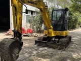 2012 Komatsu PC-55MR mini excavator, front three-quarter view
