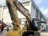 2022 Caterpillar 320GX crawler excavator, front-quarter view