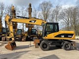 2008 Caterpillar M318D wheel excavator side view