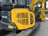 2023 Komatsu PC-55MR mini excavator, front three-quarter view