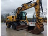 2012 Caterpillar M313D wheel excavator, front three-quarter view