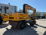 2012 Liebherr A904 C LITRONIC wheel excavator, rear three-quarter view
