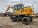 2007 Komatsu PW140-7 wheel excavator, side view