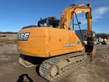 2011 Case CX130B excavator, rear three-quarter view