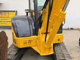 2018 Komatsu PC-55MR mini excavator, rear three-quarter view