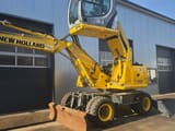 2011 New Holland WE150C wheel excavator, side view