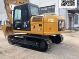2023 Caterpillar 313D2 GC crawler excavator, rear three-quarter view