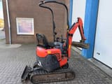 2014 Kubota U10-3 mini excavator, rear three-quarter view