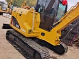 2022 Caterpillar 306D mini excavator, rear three-quarter view
