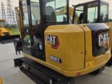 2024 Caterpillar 306E2 mini excavator, rear three-quarter view
