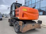 2014 Hitachi ZX140W-5 wheel excavator rear three-quarter view