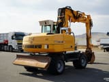2001 Liebherr A314 LITRONIC wheel excavator rear three-quarter view