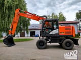 2016 Hitachi Zaxis 140W wheel excavator side view